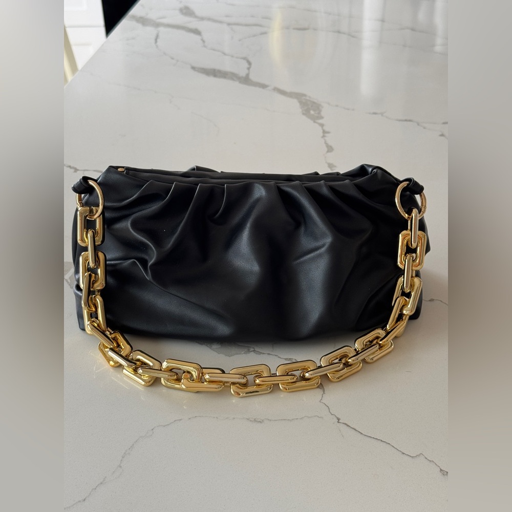 Elegant Black Leather Bag with Gold Chain